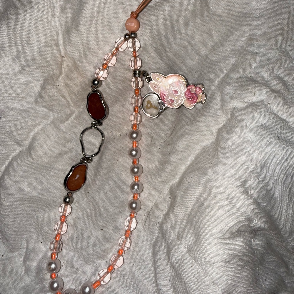 Pink labubu phone strap